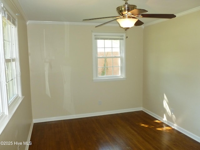 unfurnished room with ornamental molding, dark wood-type flooring, and ceiling fan