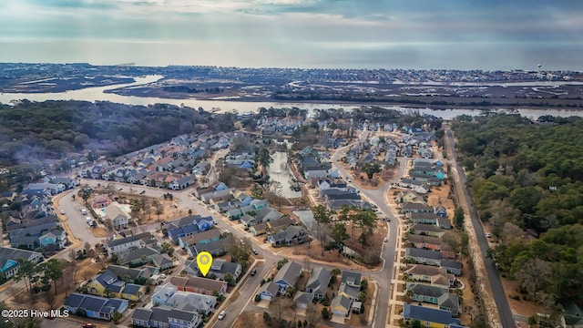 aerial view featuring a water view and a residential view