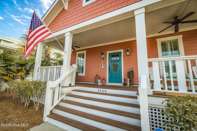 property entrance with covered porch and ceiling fan