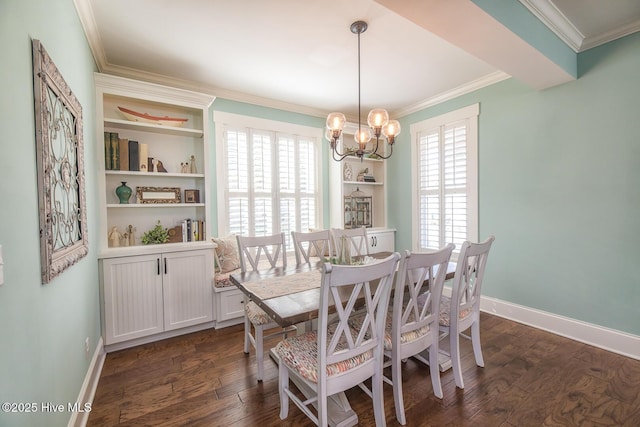 dining space with a notable chandelier, baseboards, dark wood finished floors, and crown molding