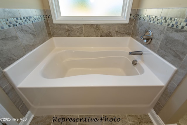 full bath featuring a garden tub
