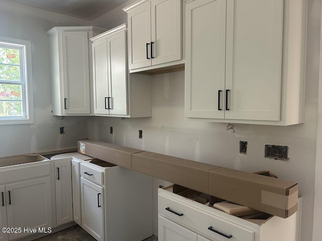 15661 Vista Point Ct, Wagram, NC 28396 - kitchen featuring white cabinetry and a sink