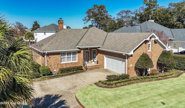 view of front of property with an attached garage, brick siding, driveway, roof with shingles, and a front yard