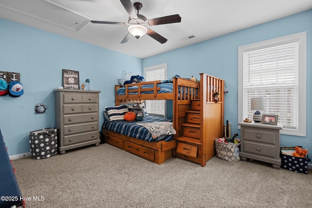 carpeted bedroom with ceiling fan