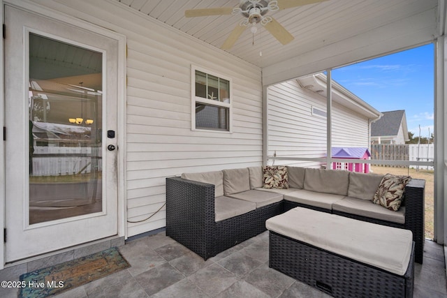 sunroom with wood ceiling and ceiling fan