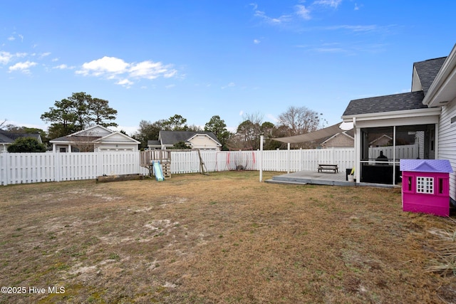 view of yard featuring a playground