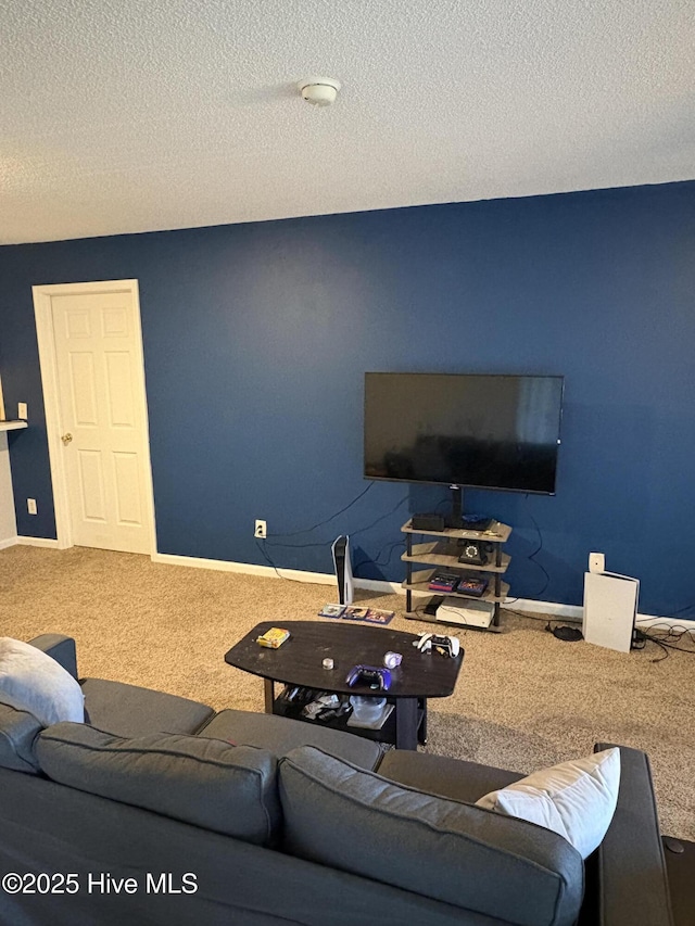 living room featuring carpet flooring and a textured ceiling