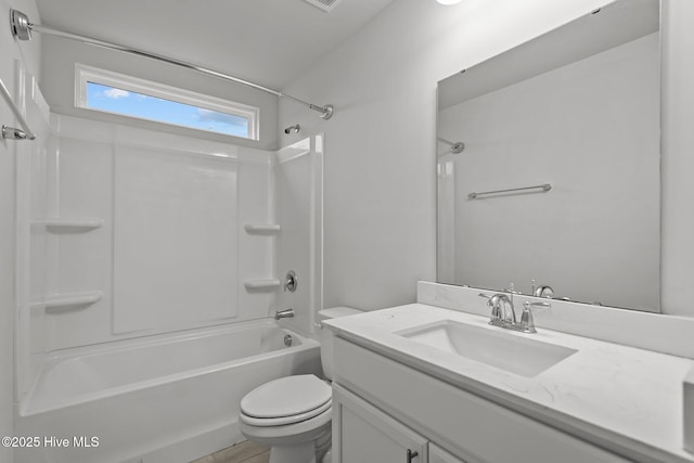 full bathroom with vanity, shower / washtub combination, and toilet