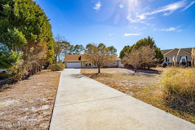 view of front of house featuring driveway and an attached garage