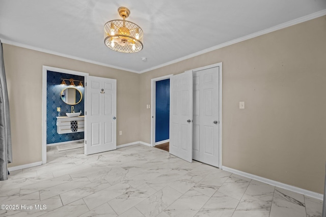 806 Wind Way, New Bern, NC 28560 - empty room with baseboards, a notable chandelier, and marble finish floor
