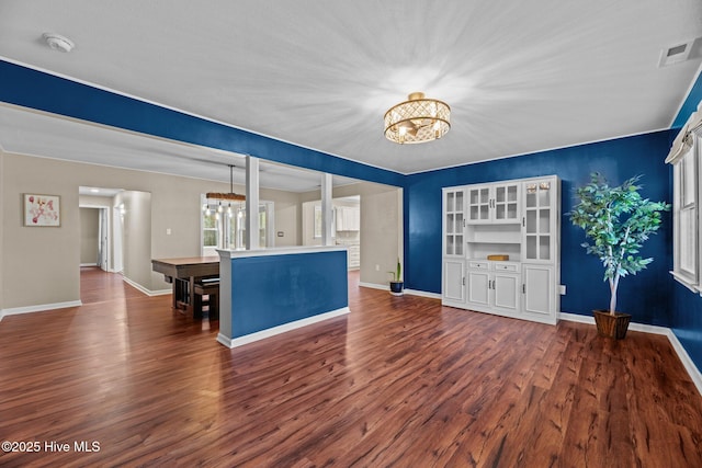 806 Wind Way, New Bern, NC 28560 - interior space with dark wood-style flooring, a notable chandelier, and visible vents