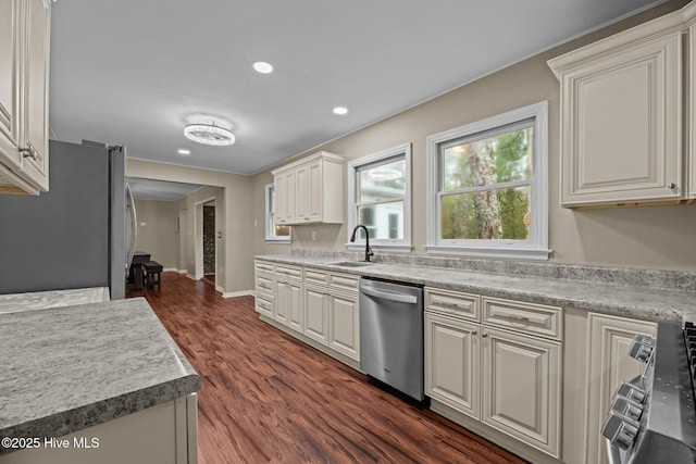 806 Wind Way, New Bern, NC 28560 - kitchen with recessed lighting, light countertops, a sink, dark wood finished floors, and stainless steel appliances