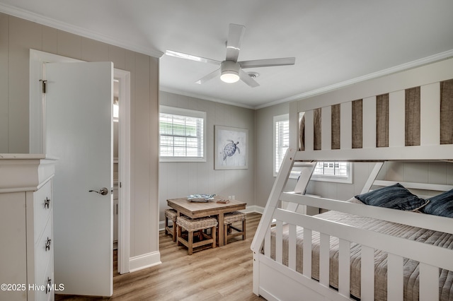 301 43rd Ave N, North Myrtle Beach, SC 29582 - bedroom with ceiling fan, light wood-type flooring, ornamental molding, and baseboards