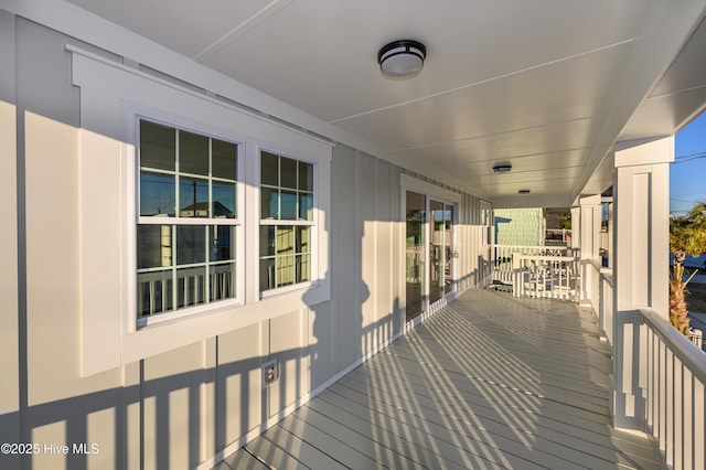 wooden terrace featuring a porch