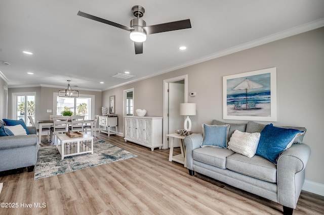 301 43rd Ave N, North Myrtle Beach, SC 29582 - living area featuring visible vents, wood finished floors, ornamental molding, and recessed lighting