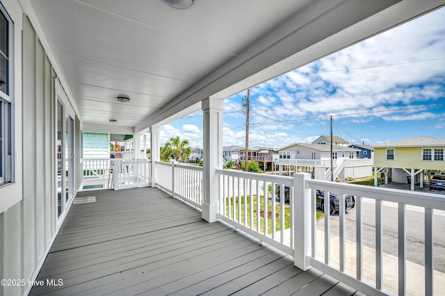 301 43rd Ave N, North Myrtle Beach, SC 29582 - wooden deck with a residential view