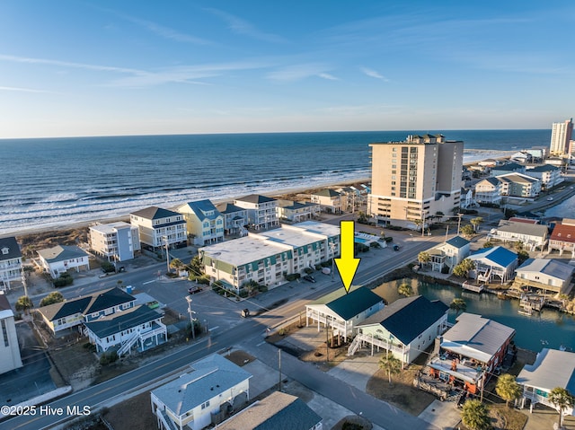 aerial view with a beach view and a water view