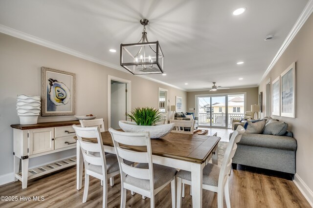 301 43rd Ave N, North Myrtle Beach, SC 29582 - dining room featuring crown molding, recessed lighting, light wood-style flooring, and baseboards