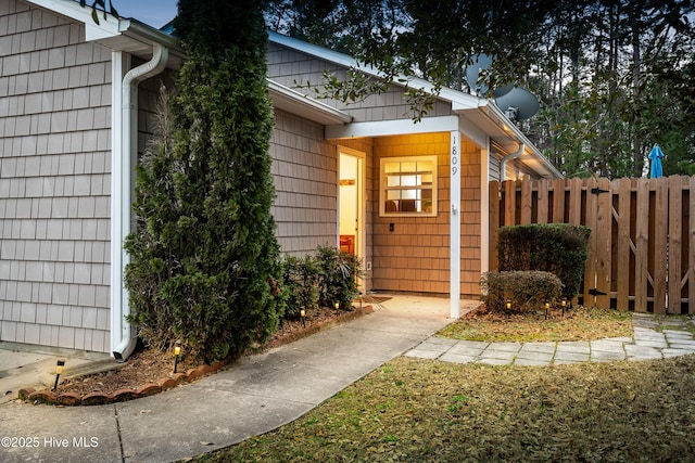 property entrance featuring fence