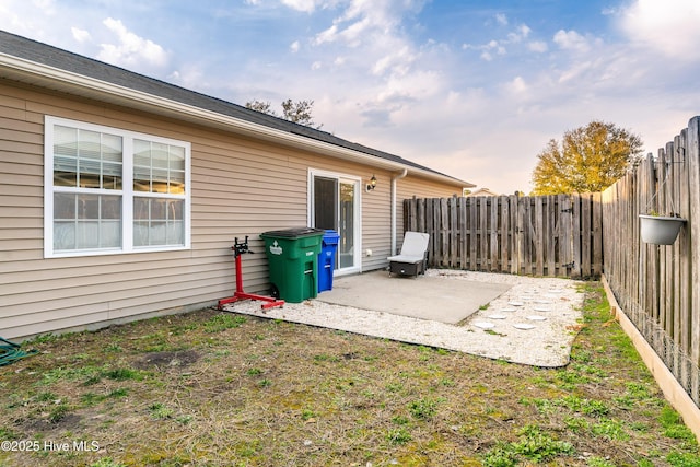 exterior space with a fenced backyard