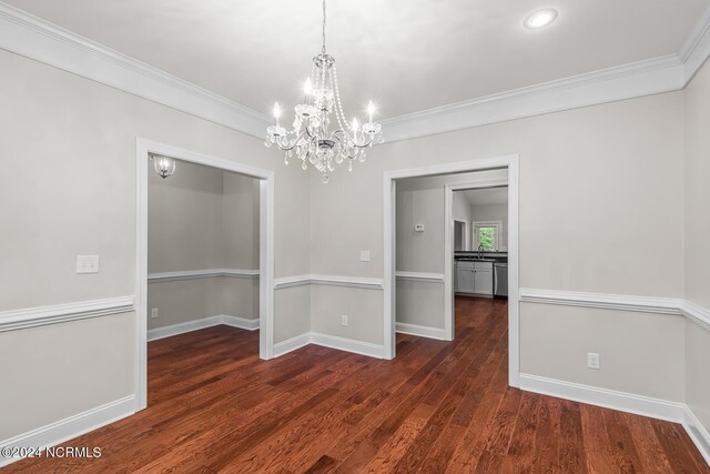 427 Candlewood Dr, Jacksonville, NC 28540 - unfurnished dining area featuring ornamental molding and dark hardwood / wood-style floors
