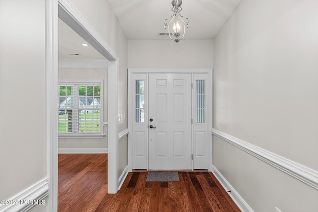 427 Candlewood Dr, Jacksonville, NC 28540 - foyer featuring dark wood-type flooring and a chandelier