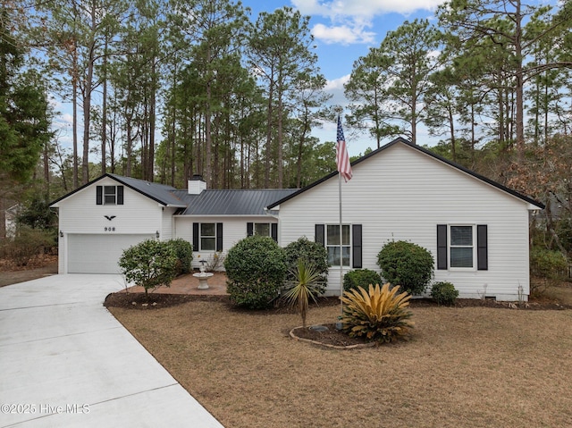 ranch-style house featuring a chimney, concrete driveway, crawl space, metal roof, and a garage