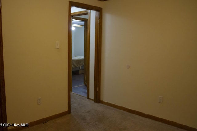 hallway with light carpet