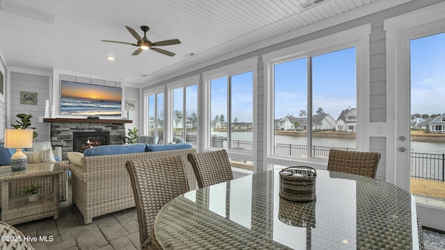 4358 Cobleskill Dr, Leland, NC 28451 - sunroom / solarium featuring plenty of natural light, a water view, stone finish floors, and recessed lighting
