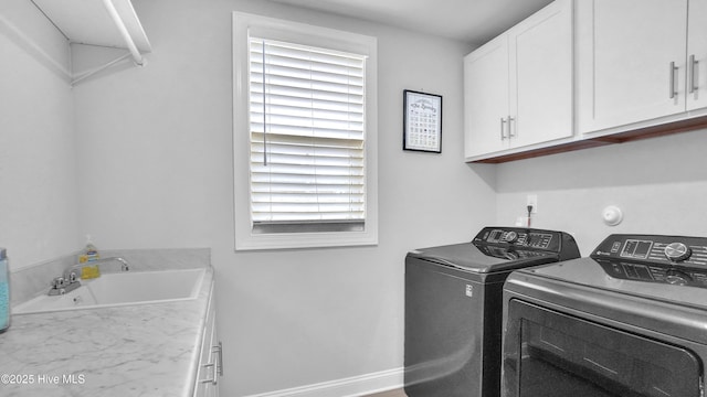 4358 Cobleskill Dr, Leland, NC 28451 - laundry area with cabinet space, separate washer and dryer, and baseboards