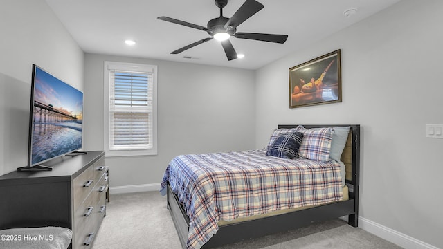 bedroom featuring a ceiling fan, baseboards, visible vents, recessed lighting, and light carpet