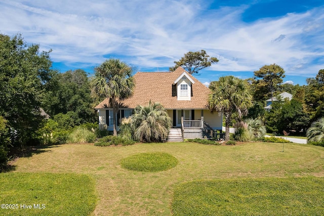 view of front of house with a front lawn and a porch