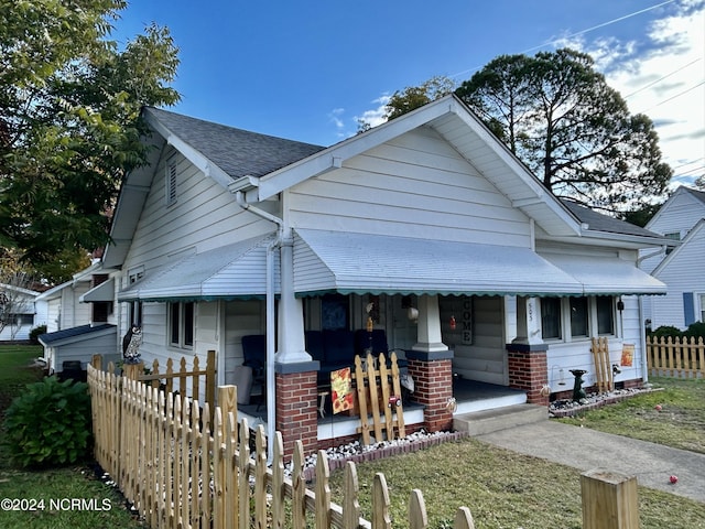 bungalow-style house featuring covered porch