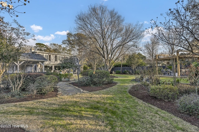 view of yard with fence