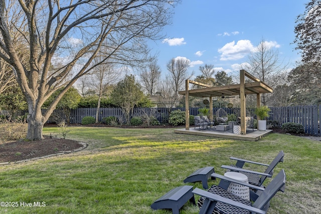 view of yard featuring a fenced backyard and a wooden deck