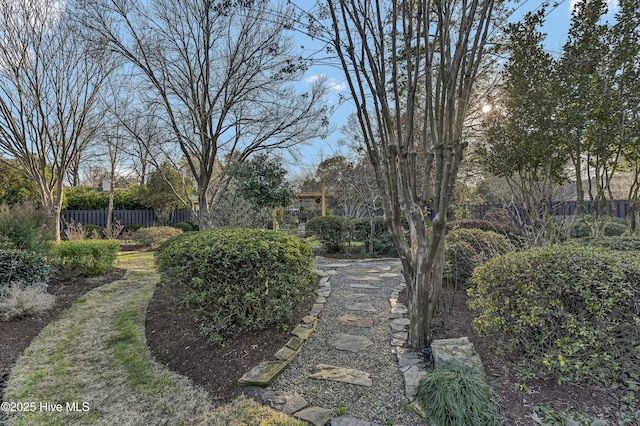 view of property's community with fence