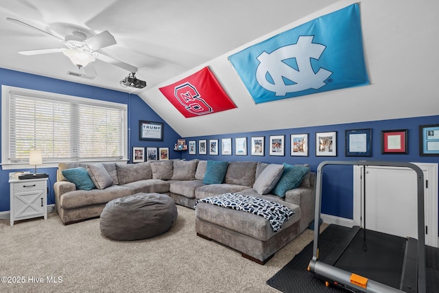 living room with lofted ceiling, visible vents, carpet, and a ceiling fan