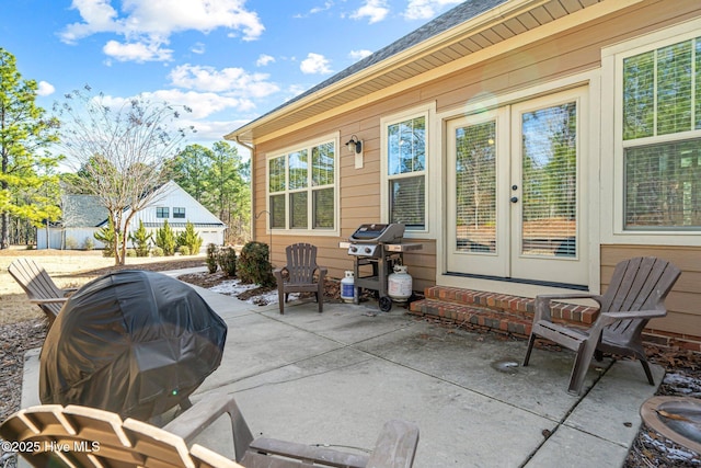 view of patio / terrace featuring french doors and grilling area