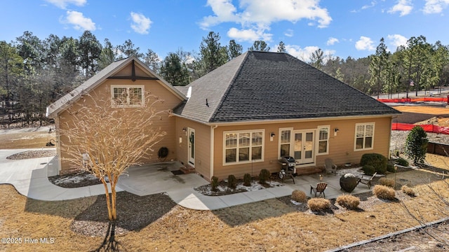 back of house featuring french doors and a patio area