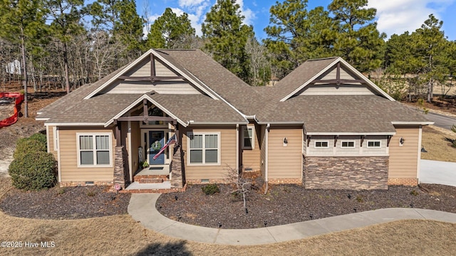 craftsman inspired home featuring crawl space and roof with shingles