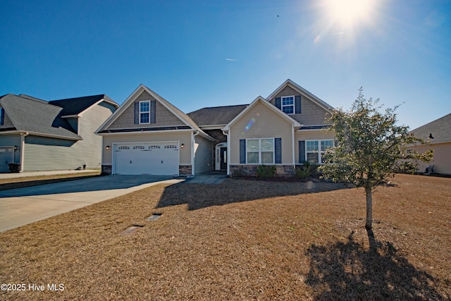 craftsman-style home with a garage