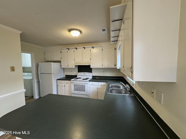 kitchen with sink, white cabinetry, a textured ceiling, white appliances, and washing machine and dryer