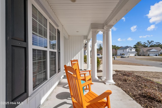 view of patio featuring a porch