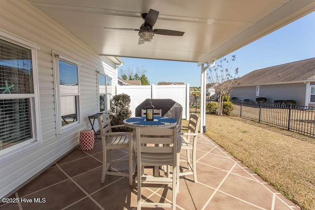 view of patio / terrace featuring ceiling fan