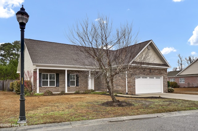 view of front facade with a garage and a front yard