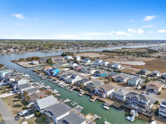 aerial view featuring a residential view and a water view