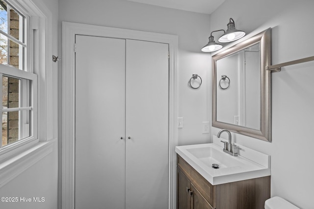 2131 Neuse Cliffs Cir, New Bern, NC 28560 - bathroom featuring vanity, toilet, and plenty of natural light