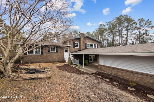 back of property featuring a patio area