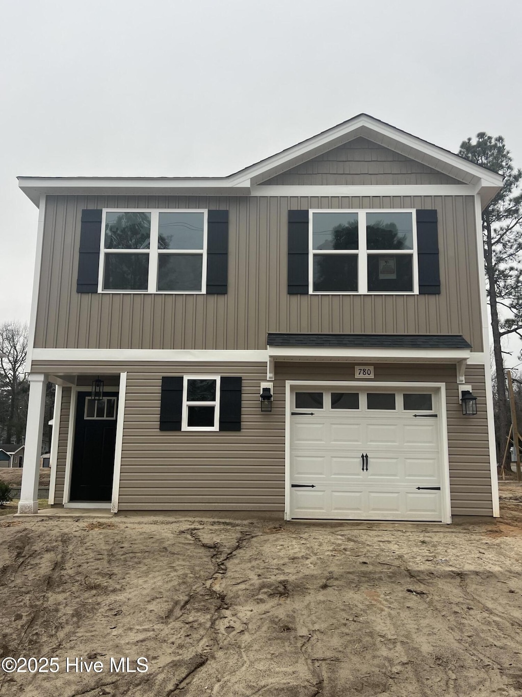 front of property featuring a garage