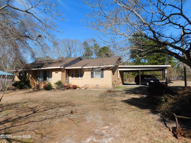 view of front of house with a carport